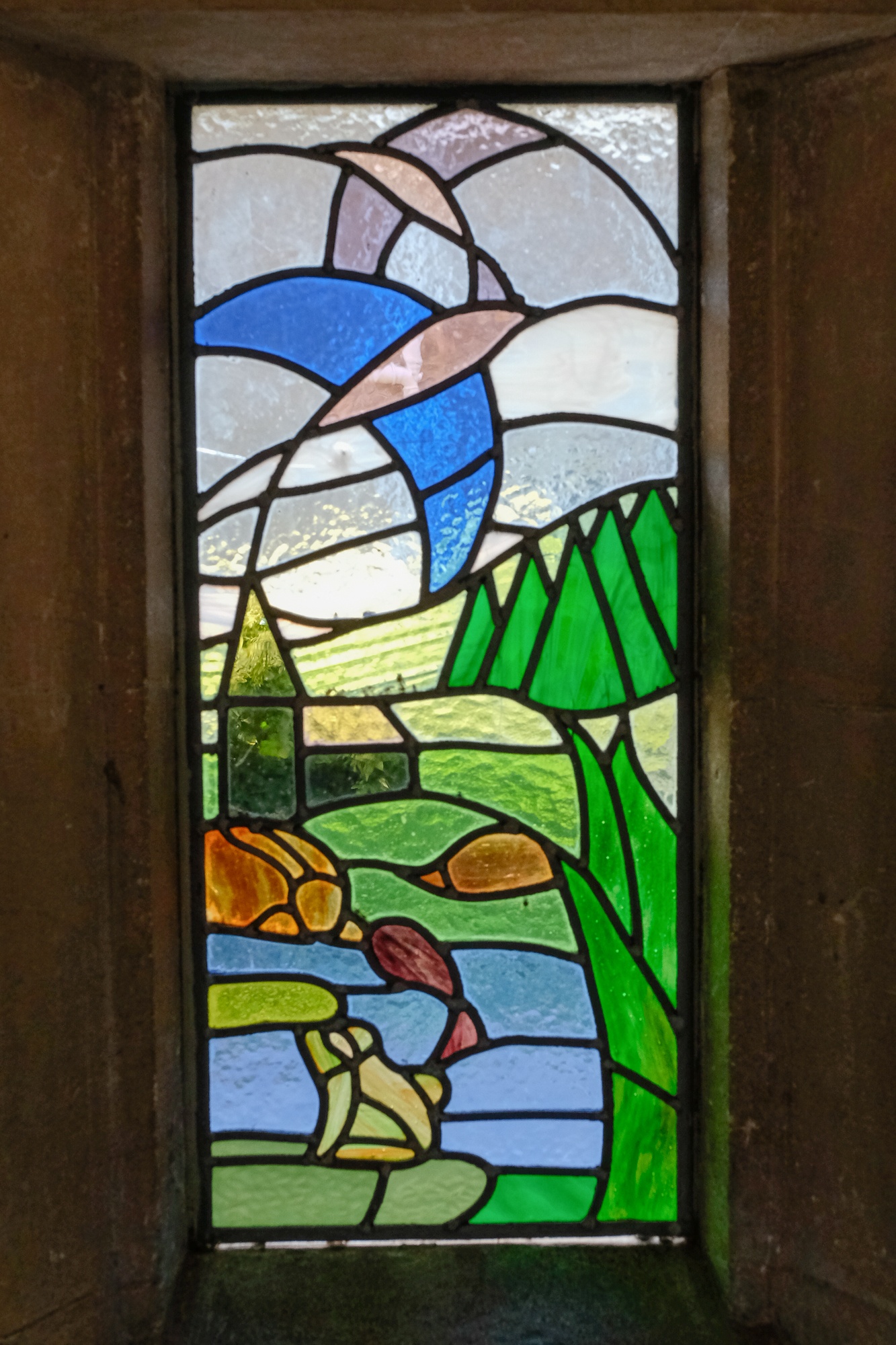 Our Stained Glass Window of the church in the Entrance