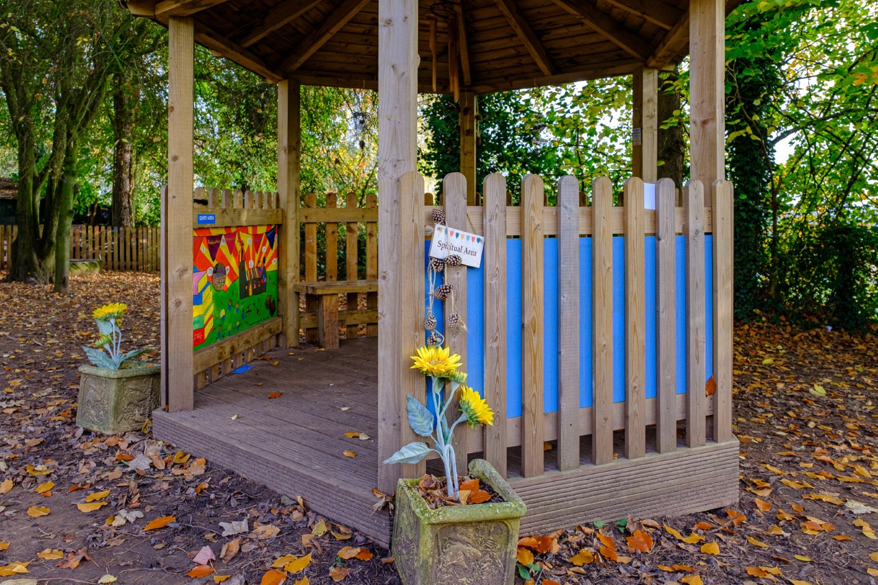 Outdoor wooden structure which is used as our spiritual area