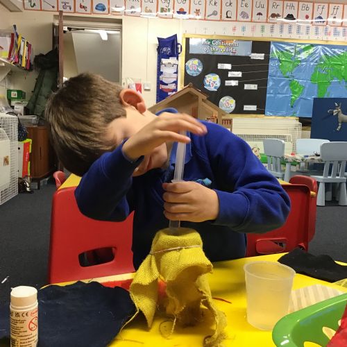 Child undertaking a science experiment