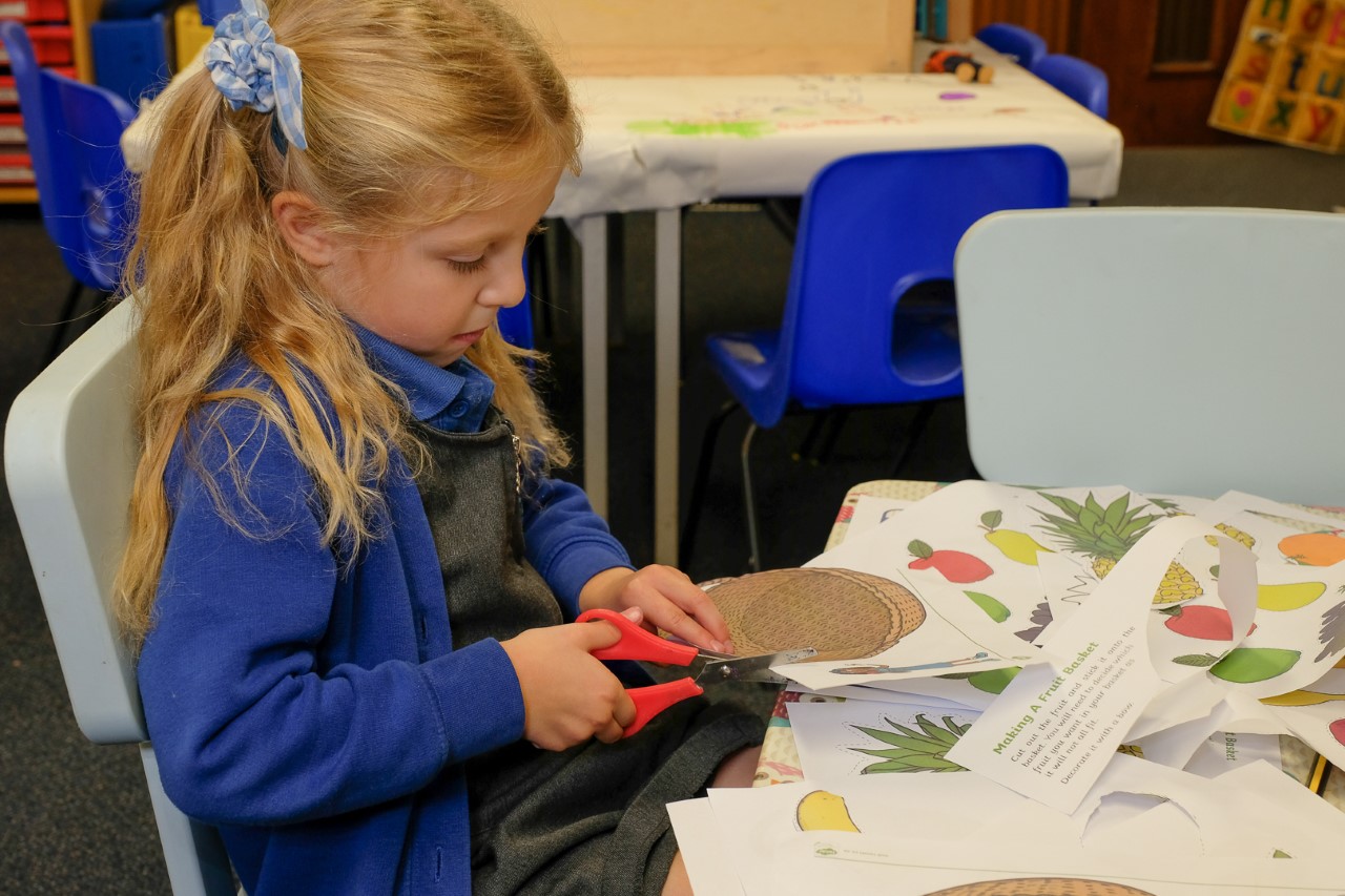 Early years pupil cutting